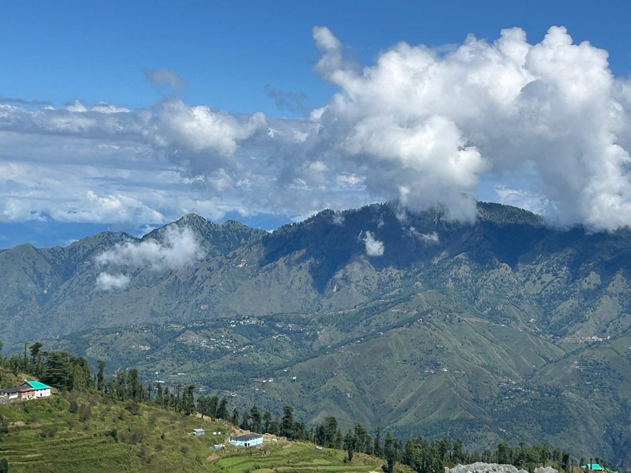 The homestay seen from the far ridge